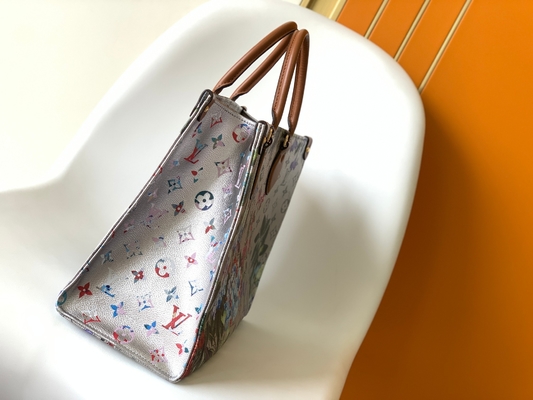 کیف زنجی کوتاه OnTheGo MM با مارک M81724 طرح گلدار بوم با روکش نقره