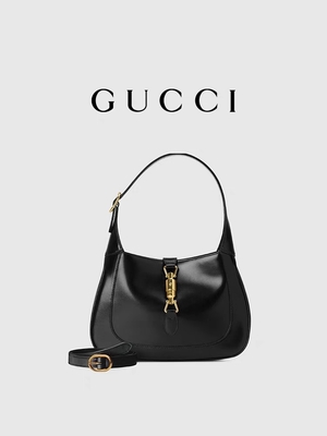 لوازم جانبی طلایی کلاسیک چرم مشکی 1961 توسط Gucci Time Honored